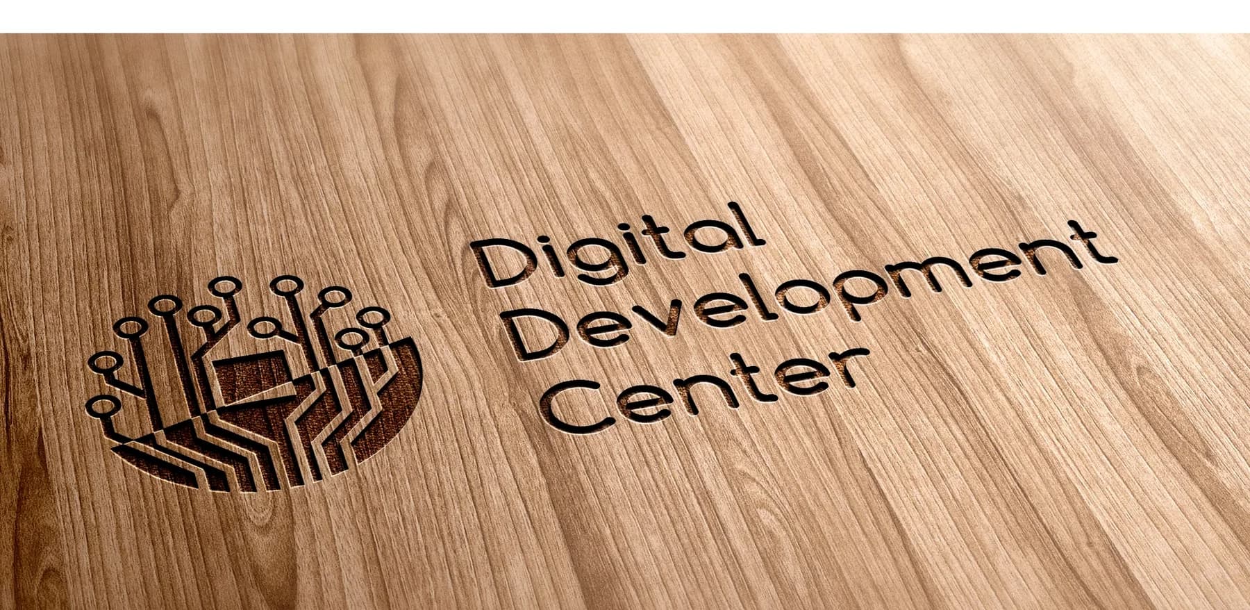 Logo als Gravur in Holz